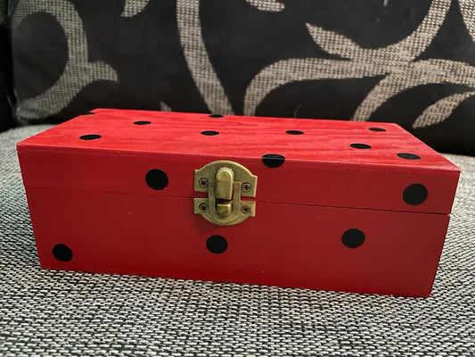 Red wooden decorative wooden box with black ladybug spots and brass latch, Caja Ladybug design.