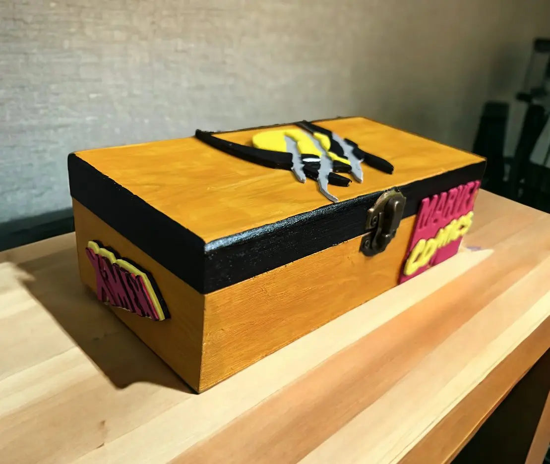 Hand-painted wooden Caja Artesanal Lobezno themed storage box with Marvel Comics design and Wolverine claw artwork