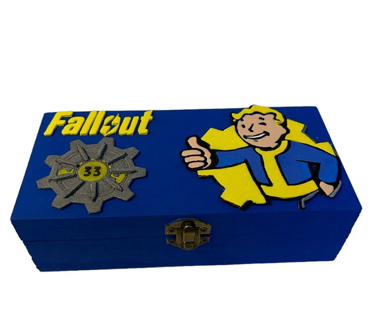 Blue wooden Fallout-themed gaming box with Vault-Tec logo and Vault Boy character on the lid, handcrafted decorative storage box.