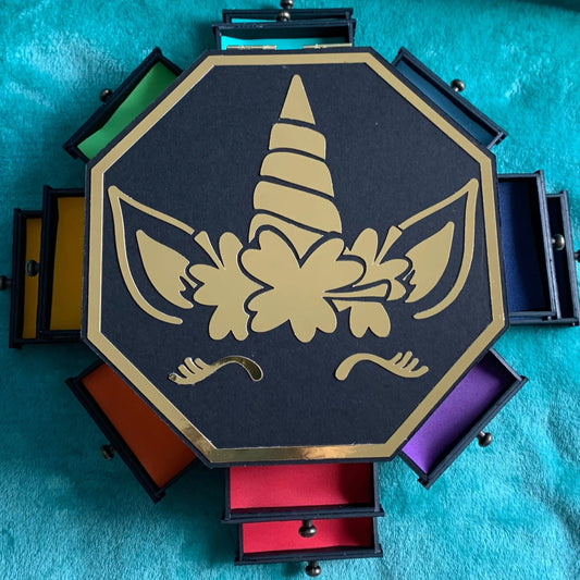 Handmade unicorn jewelry box with 12 colorful drawers and golden unicorn design on top, perfect for organizing and storing jewelry.