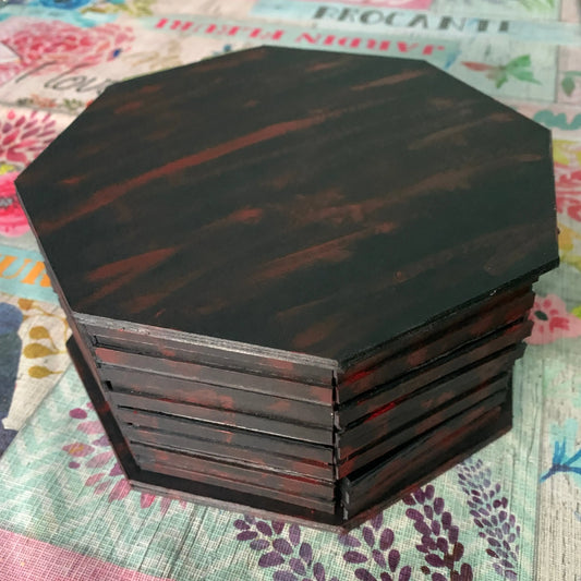 Caja base para joyero octagonal de madera oscura con 12 cajones laterales y apertura superior para almacenamiento de joyas.