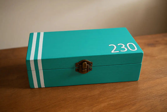 Customizable wooden Caja juego peligroso box in teal with white stripes and player number 230 on top